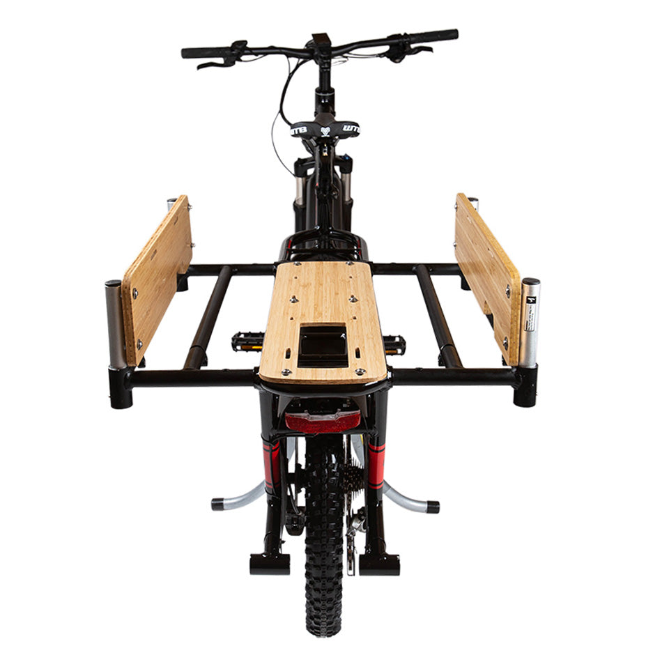 A product picture of the Yuba Carry-On platform which extends the carrying capacity of the Yuba Spicy Curry electric longtail cargo bike. Sideboards have been added here for extra rigidity.