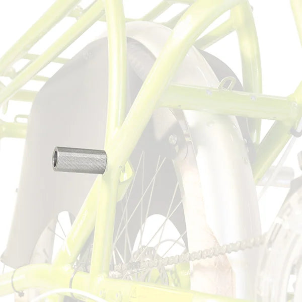 A product image showing the Yuba Kombi Peg foot rest in an isolated view with the bike frame faded in the background.