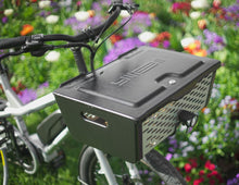 Load image into Gallery viewer, A photo of the Yuba Pot lockable box attached the the front of a Yuba longtail electric cargo bike.
