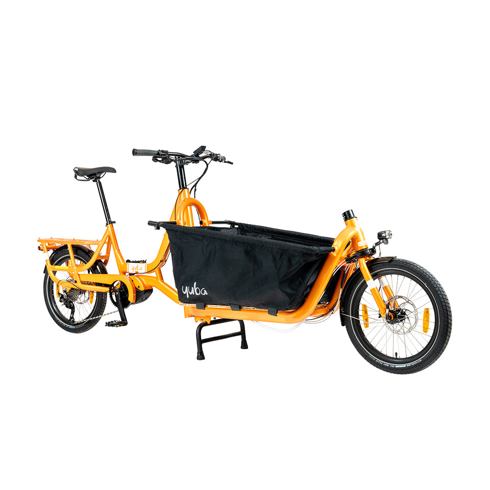 A product image of the Yuba Open Loader cargo box setup for the Yuba Supercargo CL electric cargo bike. Photo taken from the front right of the bike.