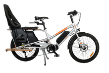 Load image into Gallery viewer, A product image of the Yuba Kombi E5 electric longtail cargo bike which can be hired from LeaseBike. The photo shows the right side of the cargo bike with a child seat and soft sport seat attached to the rear rack.

