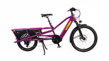Load image into Gallery viewer, A product image of the Yuba Spicy Curry V4 electric longtail cargo bike. The frame colour is Very Berry (a red grape colour) and the bike is in its basic set up, with no accessories attached. 
