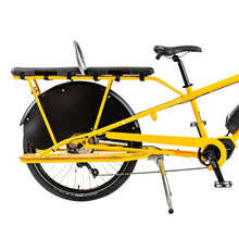 Load image into Gallery viewer, A photo of a Yuba soft spot on the back of a Yuba spicy curry cargo bike.
