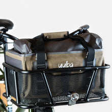 Load image into Gallery viewer, A product image for the Yuba Grab and Go bag sitting in the front basket of a Yuba longtail cargo bike.
